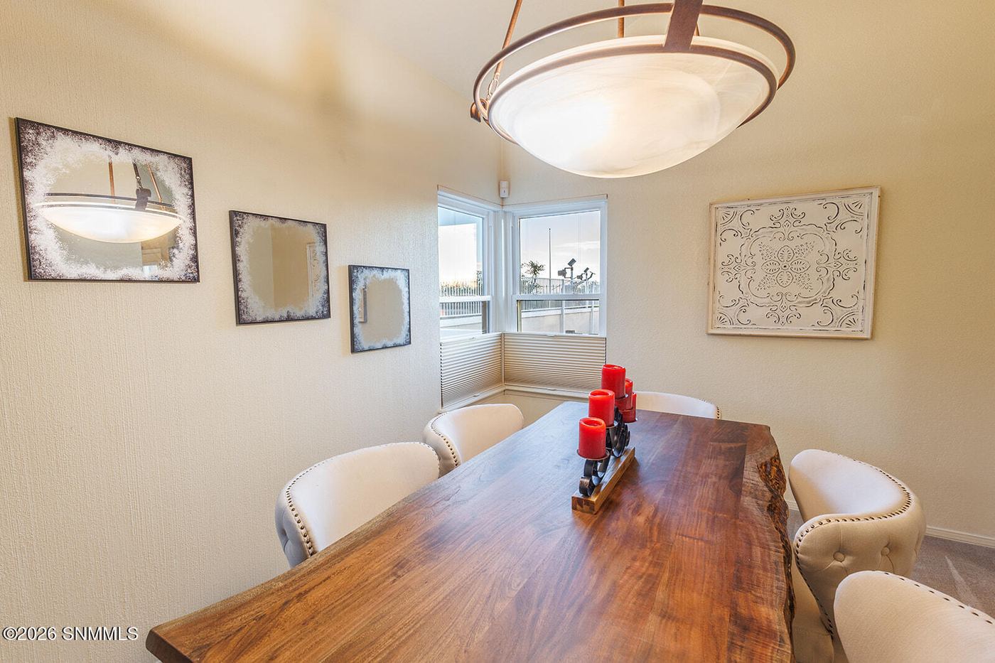 Staged great room with arched ceiling and full furniture in Las Cruces, New Mexico
