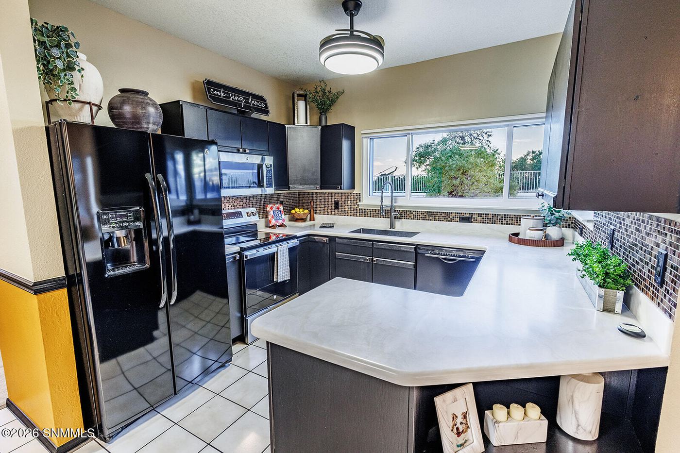 Staged kitchen island with bar stools, professional home staging Las Cruces NM