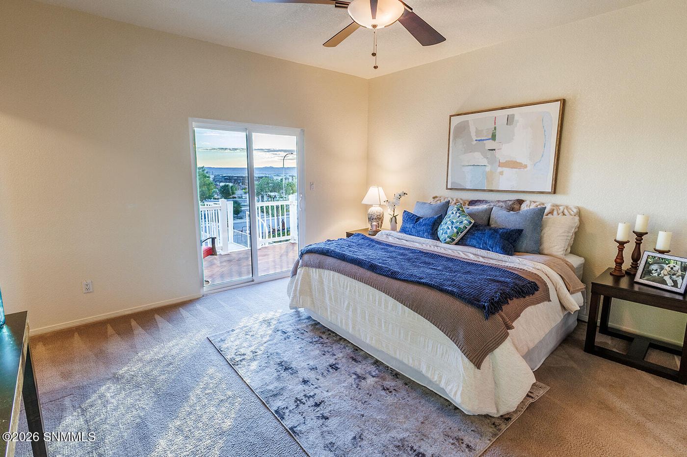 Staged primary bedroom with a real bed and nightstands in a Las Cruces home