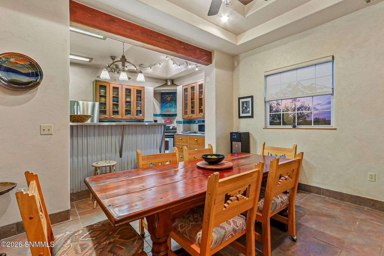 Southwest dining room with wood table and chairs, Black Quartz Road Las Cruces